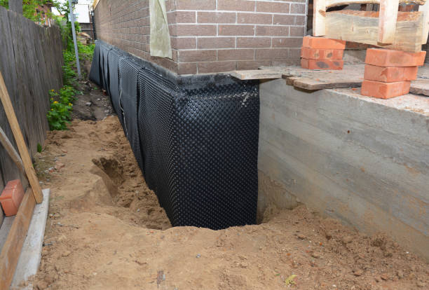 Happy homeowners after waterproofing job in Huntington Woods